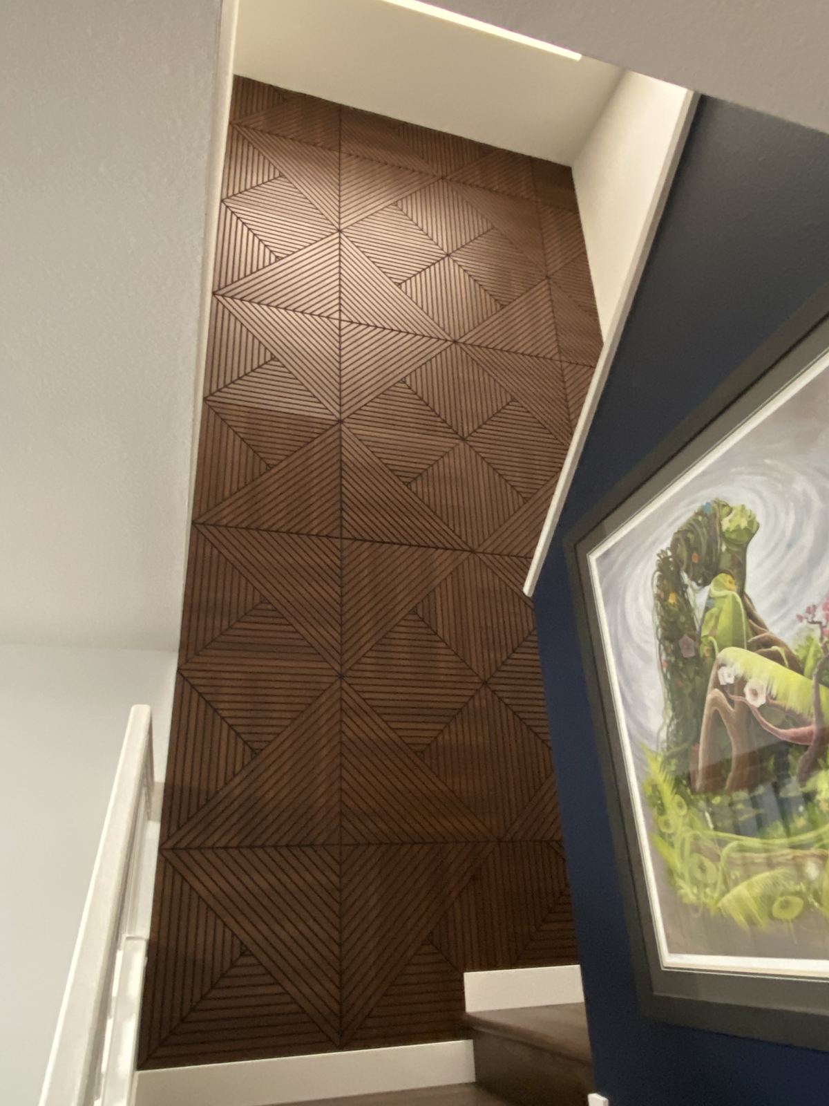 Geometric wood slat accent panel wall, staircase feature wall